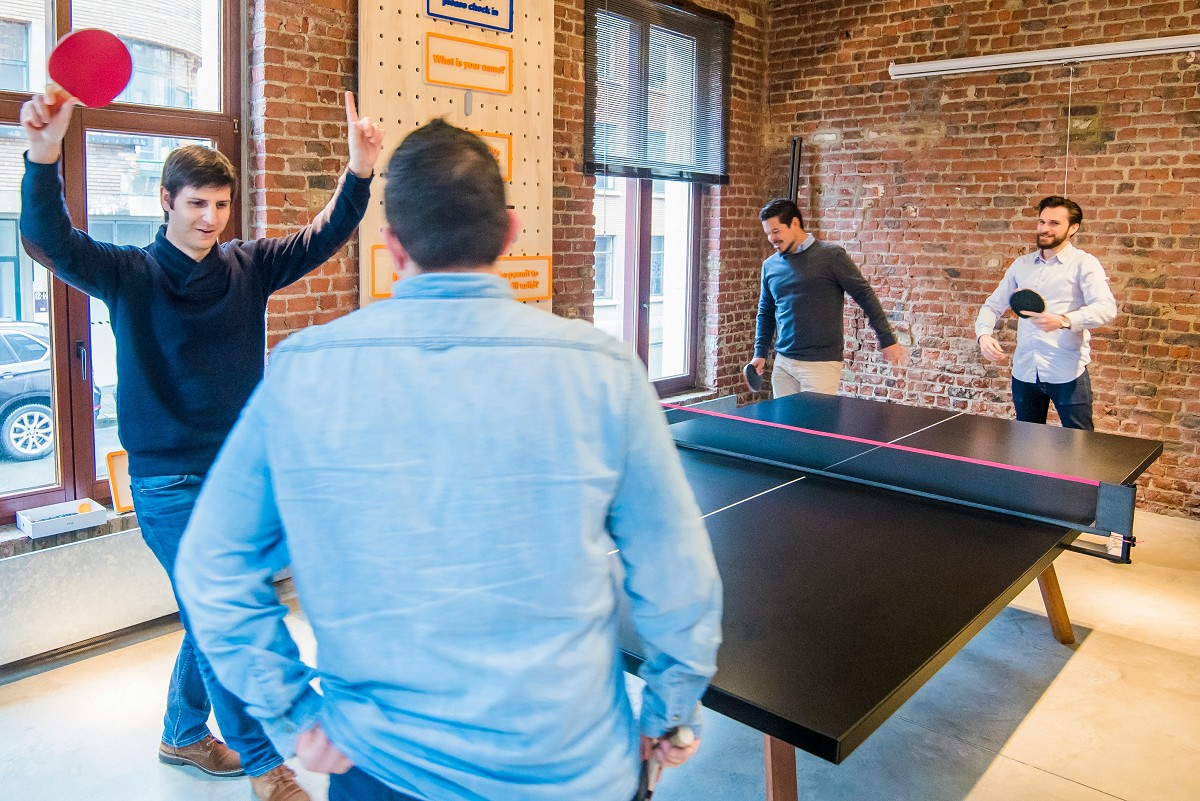 Team playing ping pong, Lego for Team Development